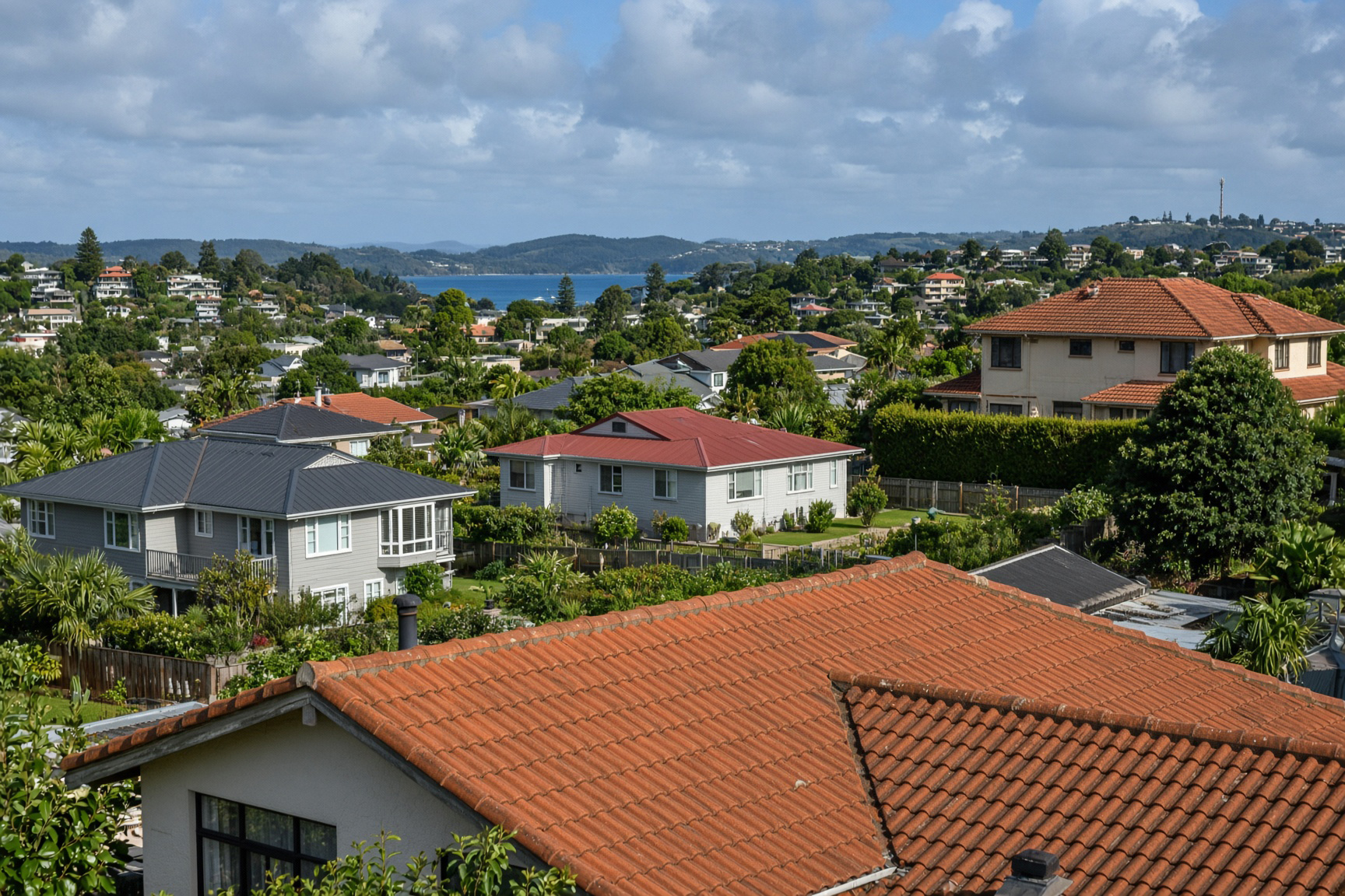 Coated tile roof on an Auckland home after washing and recoating